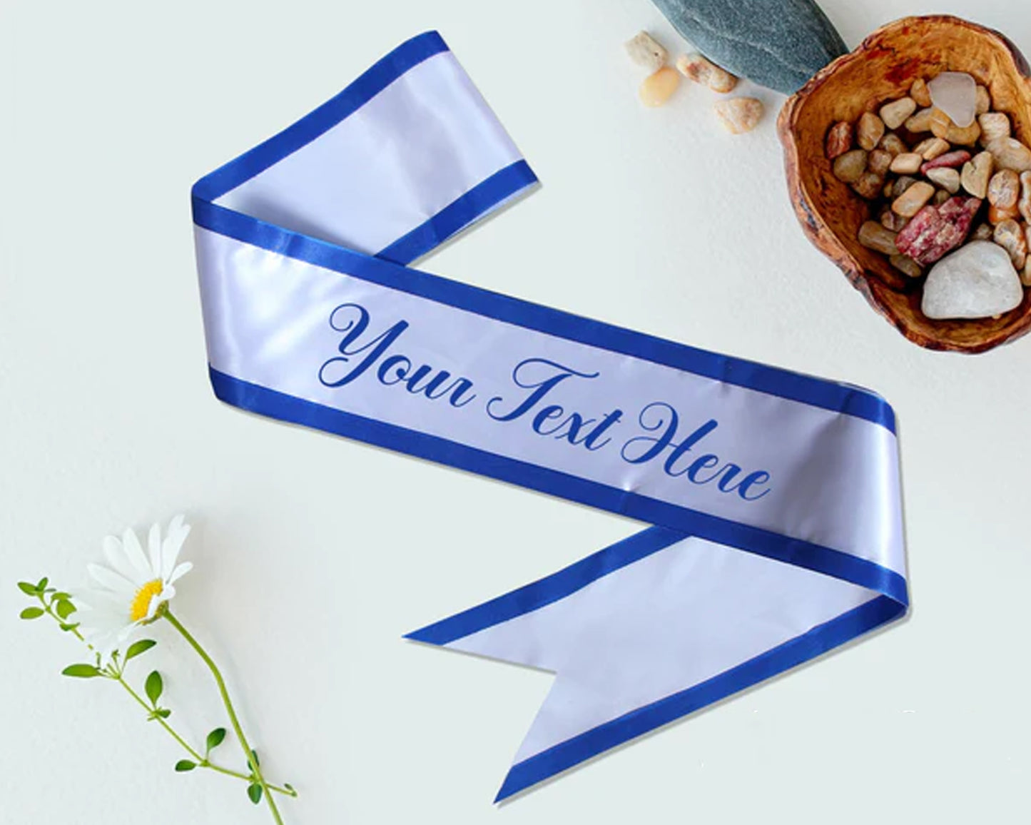 Elegant white satin sash with bold blue trim and customizable text, perfect for events, pageants, and special occasions.