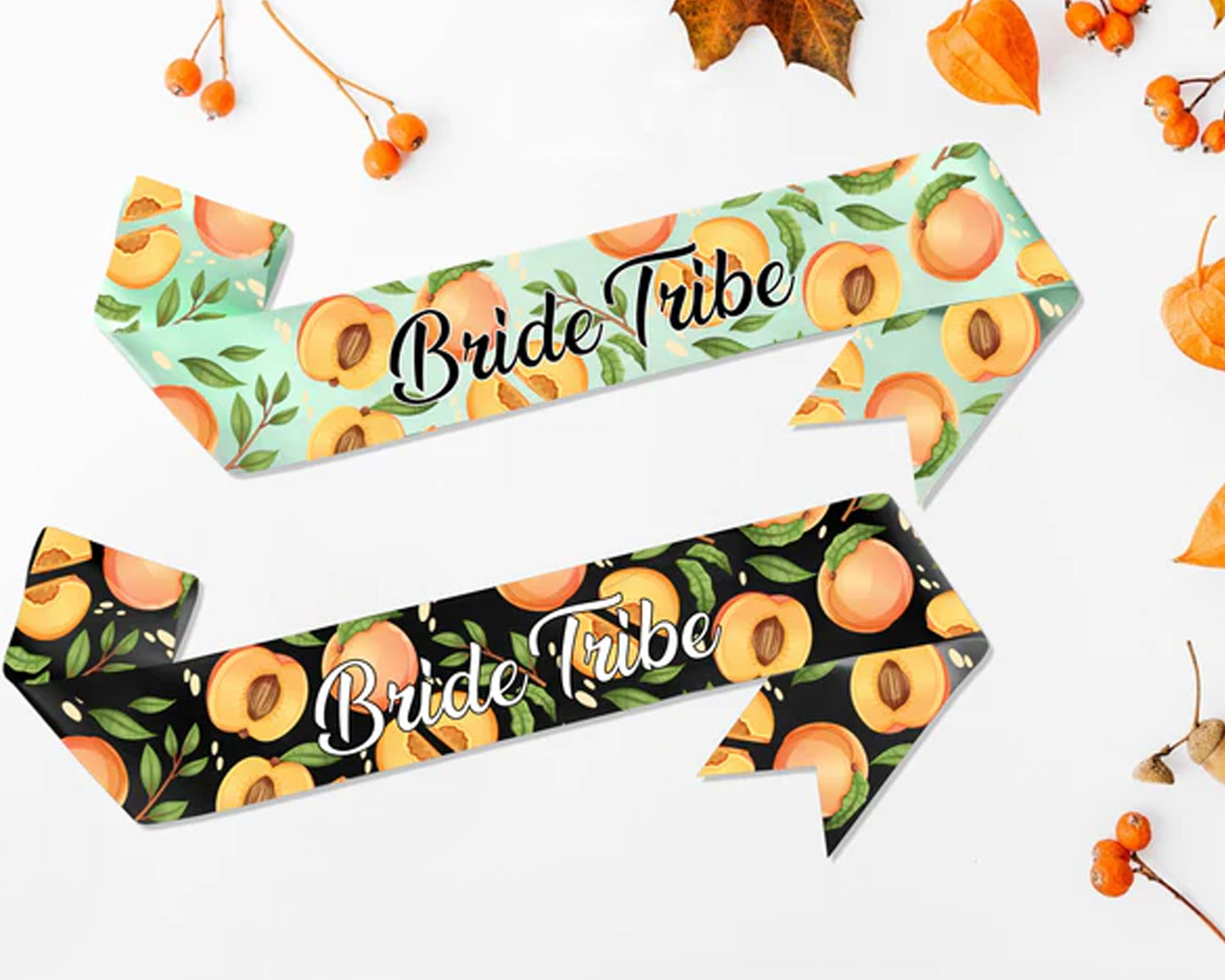Two stylish sashes with peach-themed designs, one in mint green and the other in black, featuring "Bride Tribe" text for bachelorette celebrations.