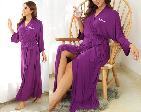 Woman wearing a personalized purple full-length robe with "Grace" print on the chest
