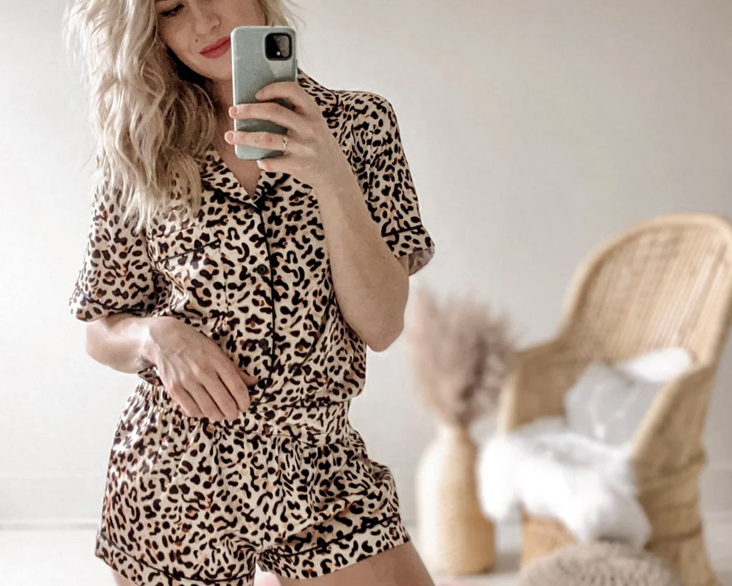 Leopard Elegance PJs Sleep Set by USA Blissful World – a luxurious satin pajama set featuring a bold leopard print, a button-up top, and matching shorts for a stylish and comfortable night's sleep.