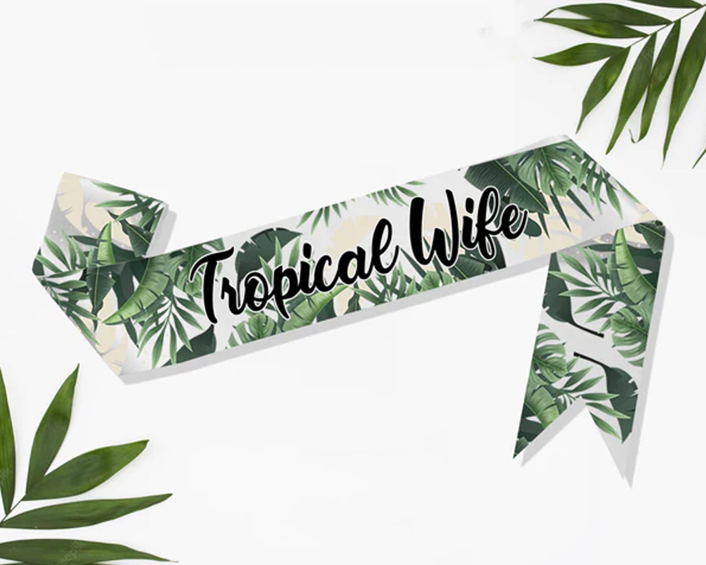 White sash with green tropical leaf design and "Tropical Wife" text, perfect for themed parties and bridal events.
