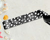 Elegant black-and-white print sash with a fun twist. Made in USA by Blissful World.