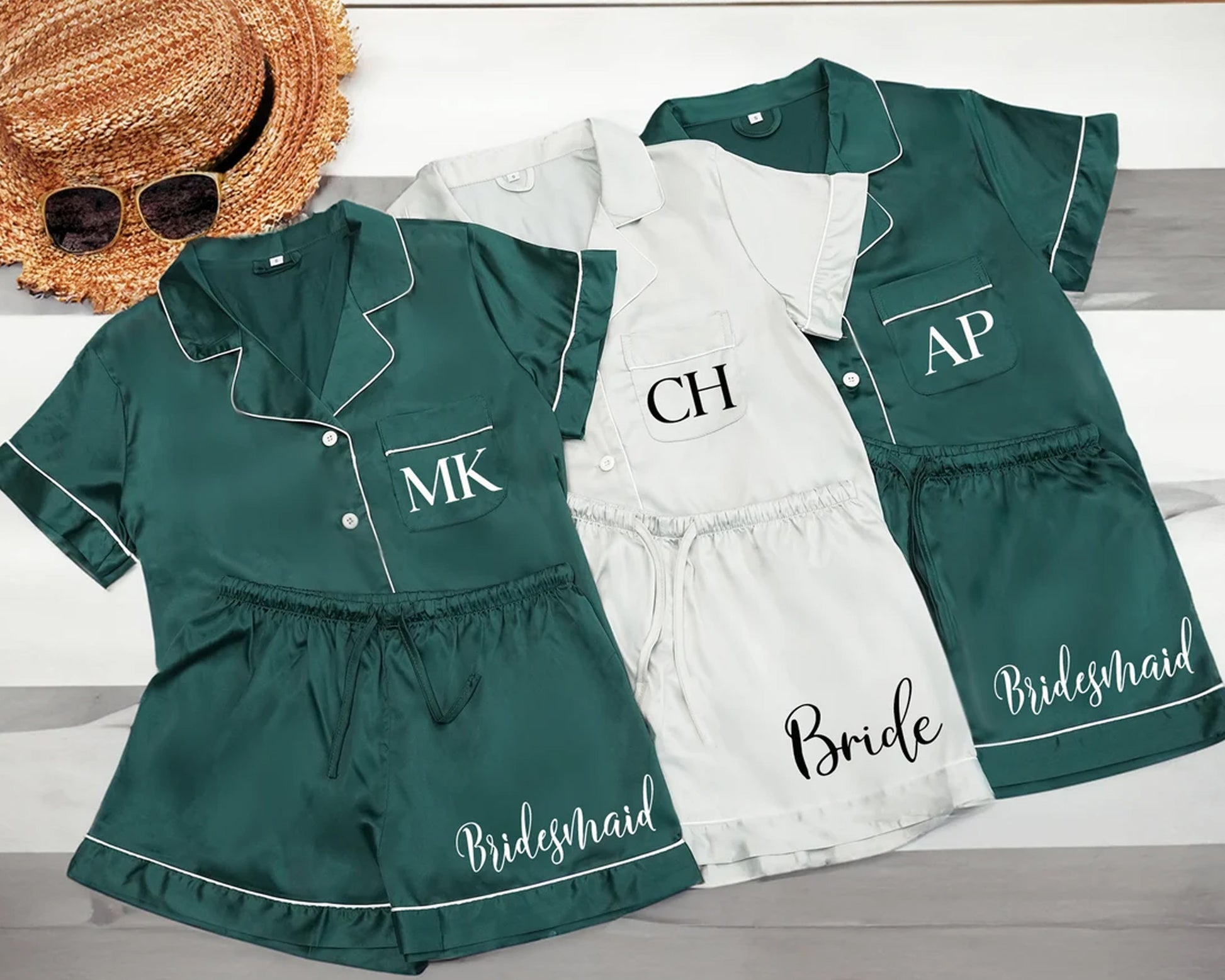Chic and cozy satin sleepwear set with a classic collared top and matching shorts, perfect for lounging in style.