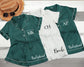 Chic and cozy satin sleepwear set with a classic collared top and matching shorts, perfect for lounging in style.