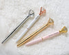 Elegant diamond-topped pens in silver, white, gold, and pink, engraved with "Bride" and "Bride's Babes," perfect for bridal party gifts.