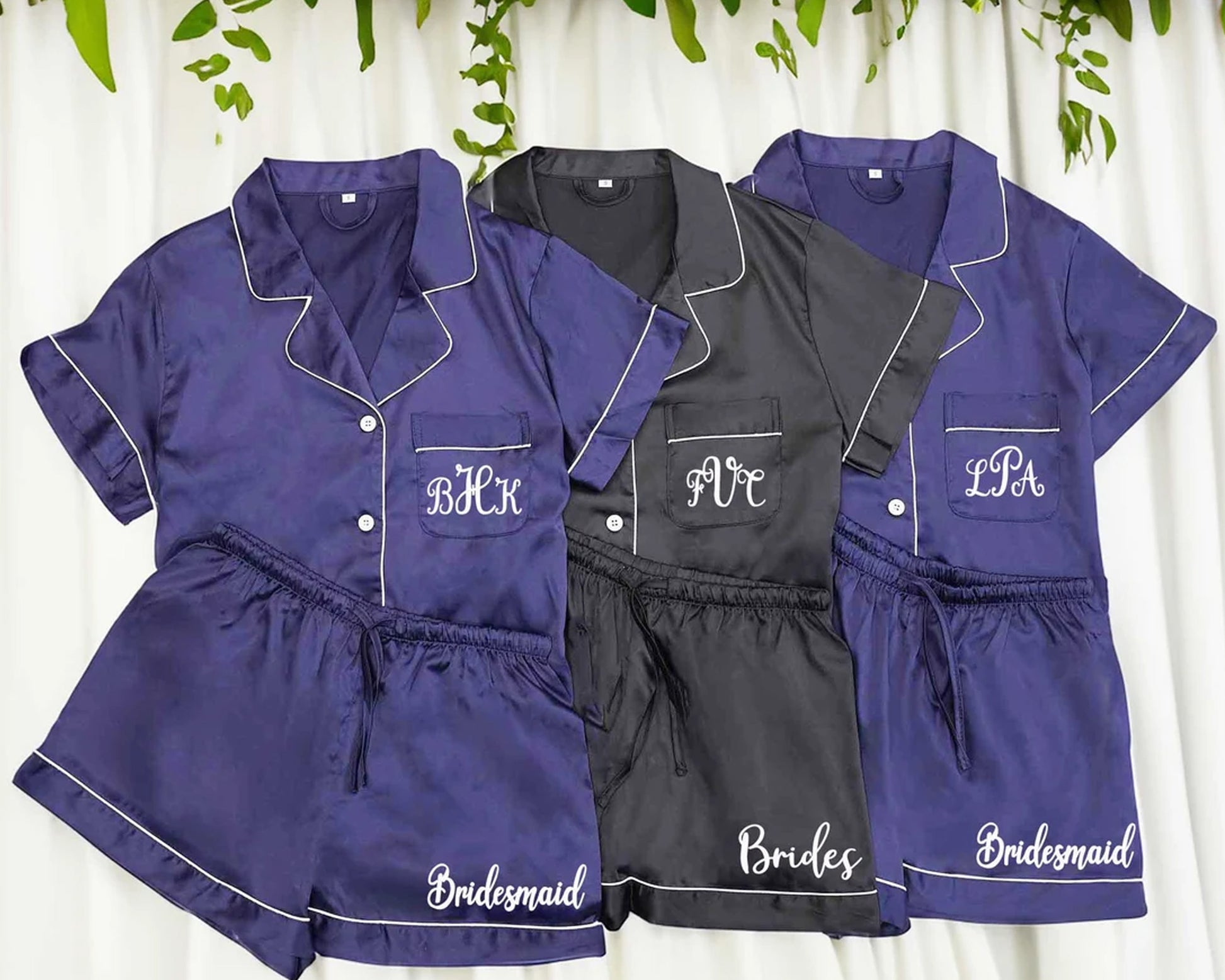 Elegant and silky satin short pajama set featuring a relaxed-fit button-up top and matching shorts, perfect for comfortable and stylish sleepwear.