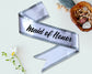 White Maid of Honor sash with elegant silver trim, perfect for bridal parties and wedding celebrations.
