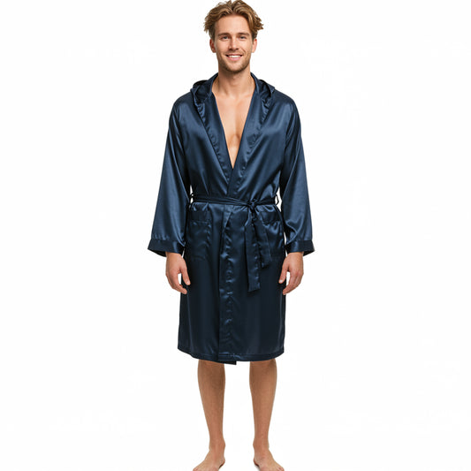Man wearing a navy satin robe on a white background
