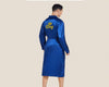 A male model wearing a royal blue satin robe with "King" and a gold crown embroidered on the back. The robe has a luxurious silky texture and a matching belt for a refined look.