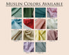 Display of muslin fabric swatches in various colors on a beige background.