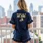 Back view of navy blue satin pajamas featuring gold Wake Up and Hit Zero cheer slogan