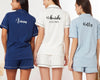 Bridal party pajamas with personalized names on the back.