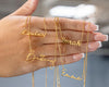 Gold name necklaces: Lindsey, Sarahi, Bethany, Emma on a hand.