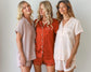 Luxurious Satin Short PJs by USA Blissful World, featuring a silky-smooth fabric, button-up top, and matching shorts for ultimate comfort and elegance. Perfect for lounging or a restful night's sleep.