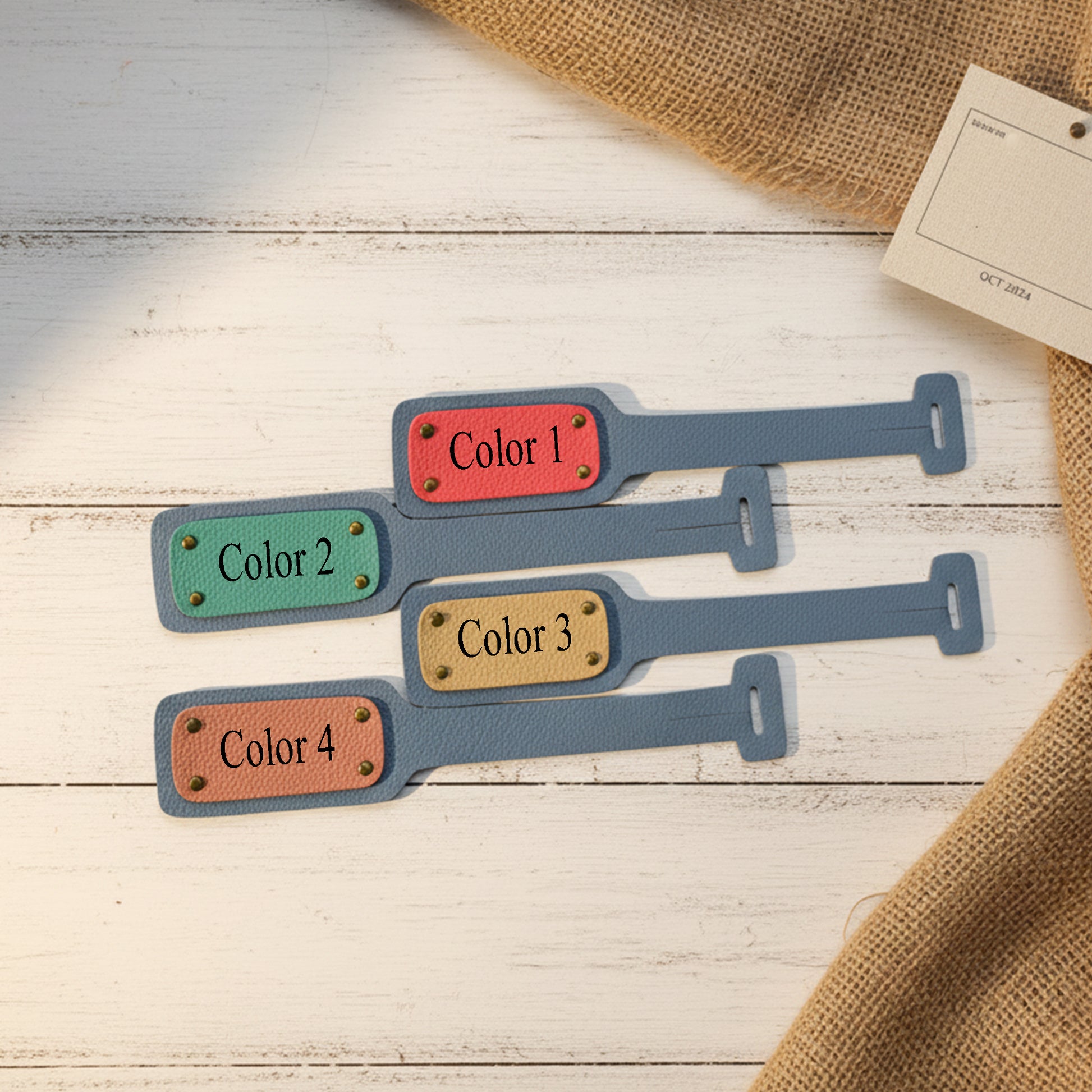 Set of colorful leather luggage tags on a wooden surface