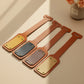 Set of leather luggage tags in various colors on a beige surface.