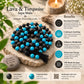 Lava and turquoise japa mala beads arranged on a stone beside a lit candle, with text overlays describing benefits and explaining the meanings of lava stone and turquoise stone.