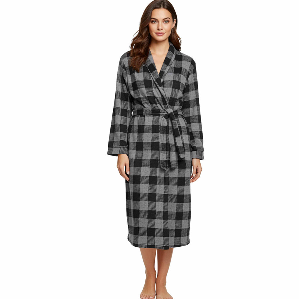 Woman wearing a black and gray checkered robe on a white background