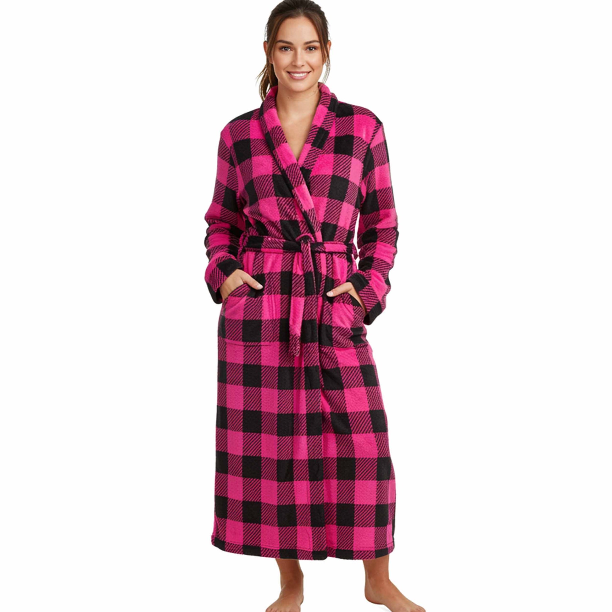 Woman wearing a pink and black checkered robe on a white background