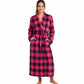 Woman wearing a pink and black checkered robe on a white background