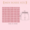Men's boxer size chart with waist and length measurements on a pink background