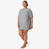 wearing a gray sleepshirt 